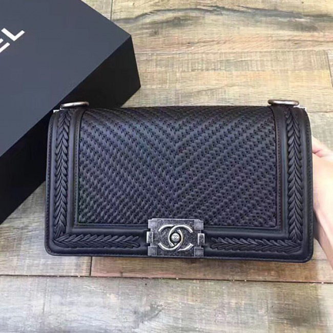 Ch**el braided calfskin boy bag black