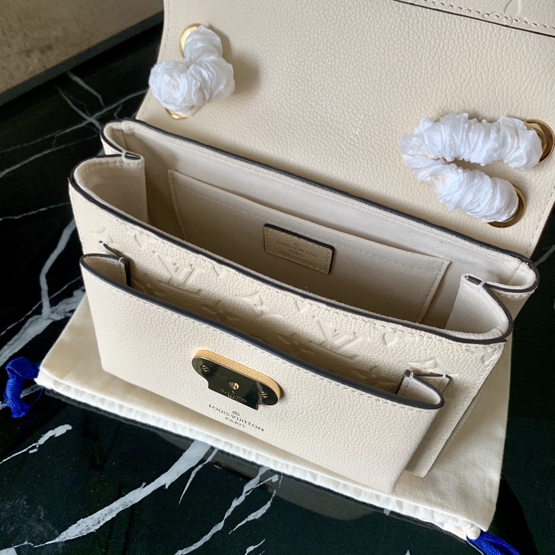 l0vis Vvtt0n vavin bb monogram empreinte leather cream  m45277 21 cm
