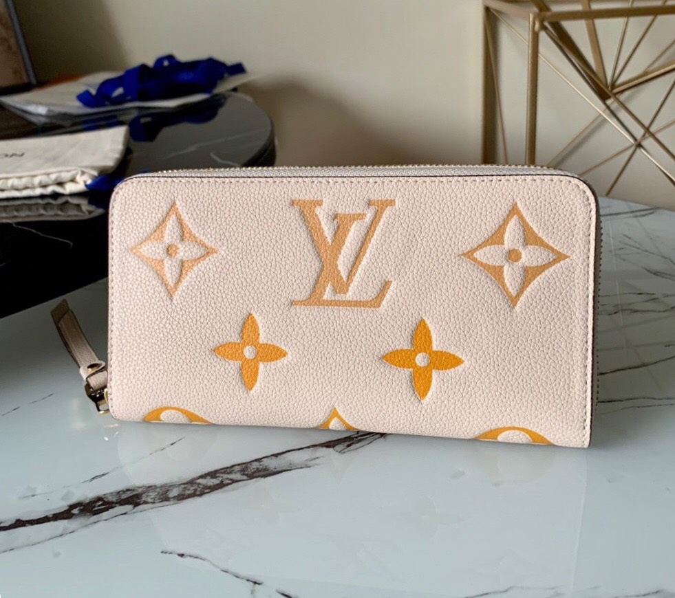 l0vis Vvtt0n by the pool zippy wallet monogram empreinte in cream m80402 19.5 x 10.5 x 2.5 cm