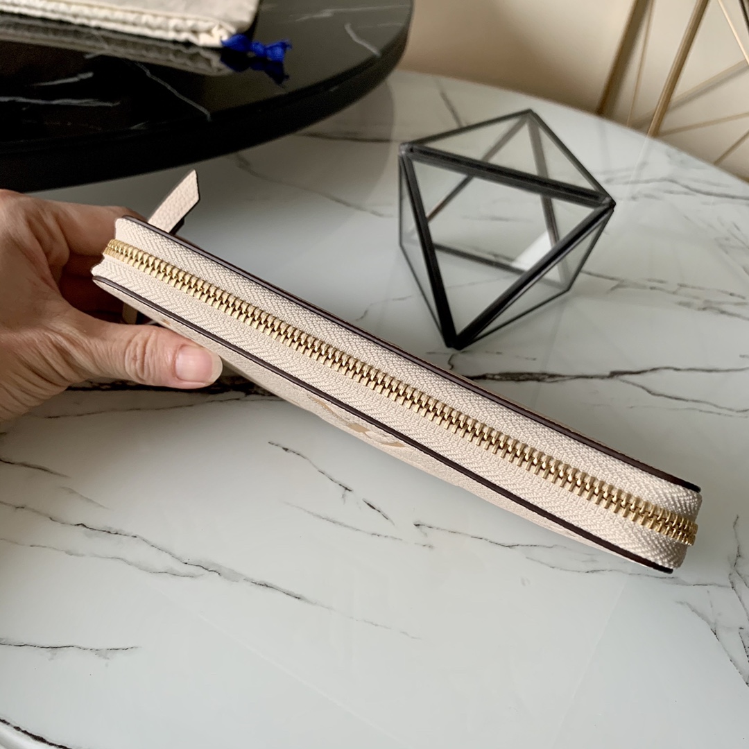 l0vis Vvtt0n by the pool zippy wallet monogram empreinte in cream m80402 19.5 x 10.5 x 2.5 cm