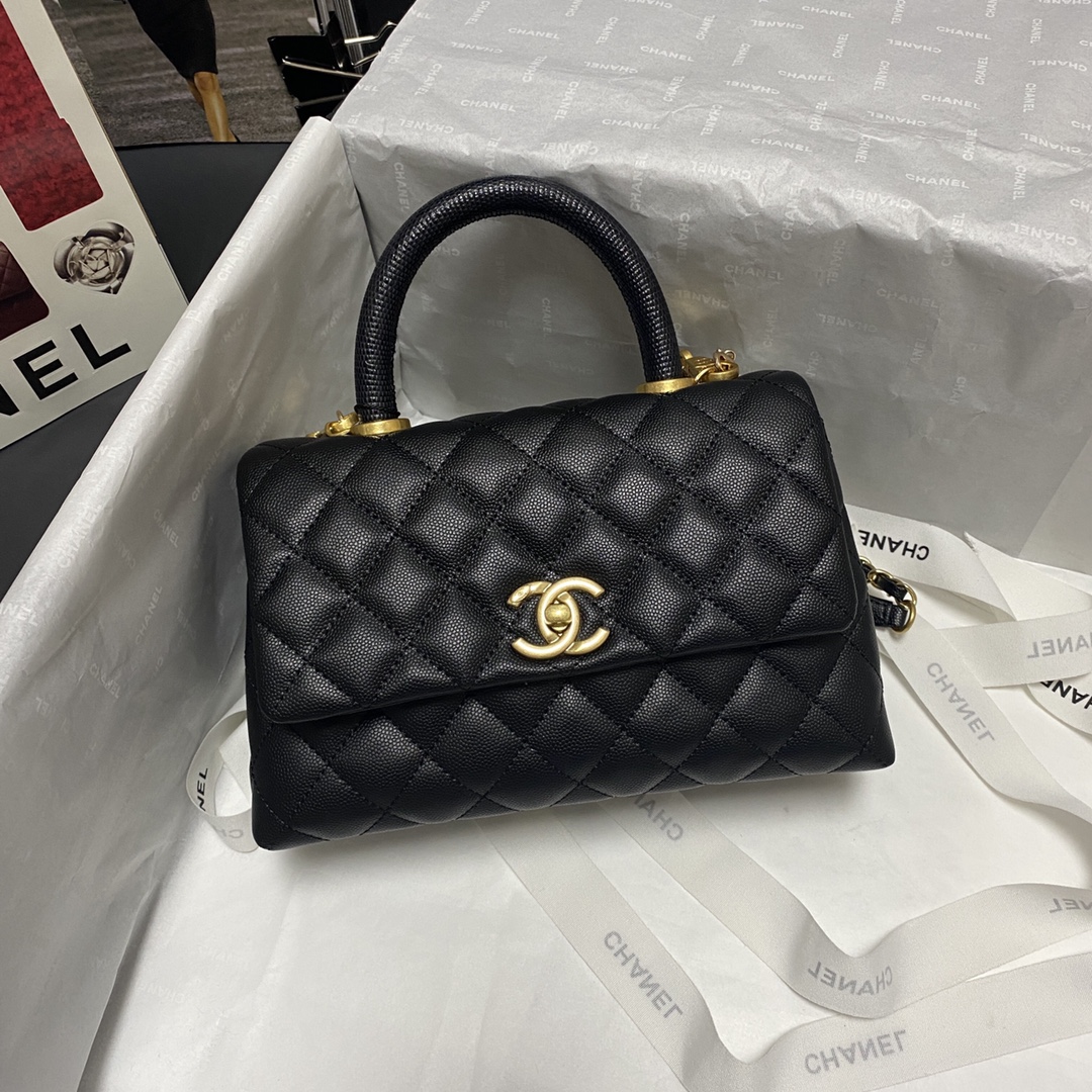 Ch**el flap bag with black top handle grained calfskin gold metal black a92990 23 cm