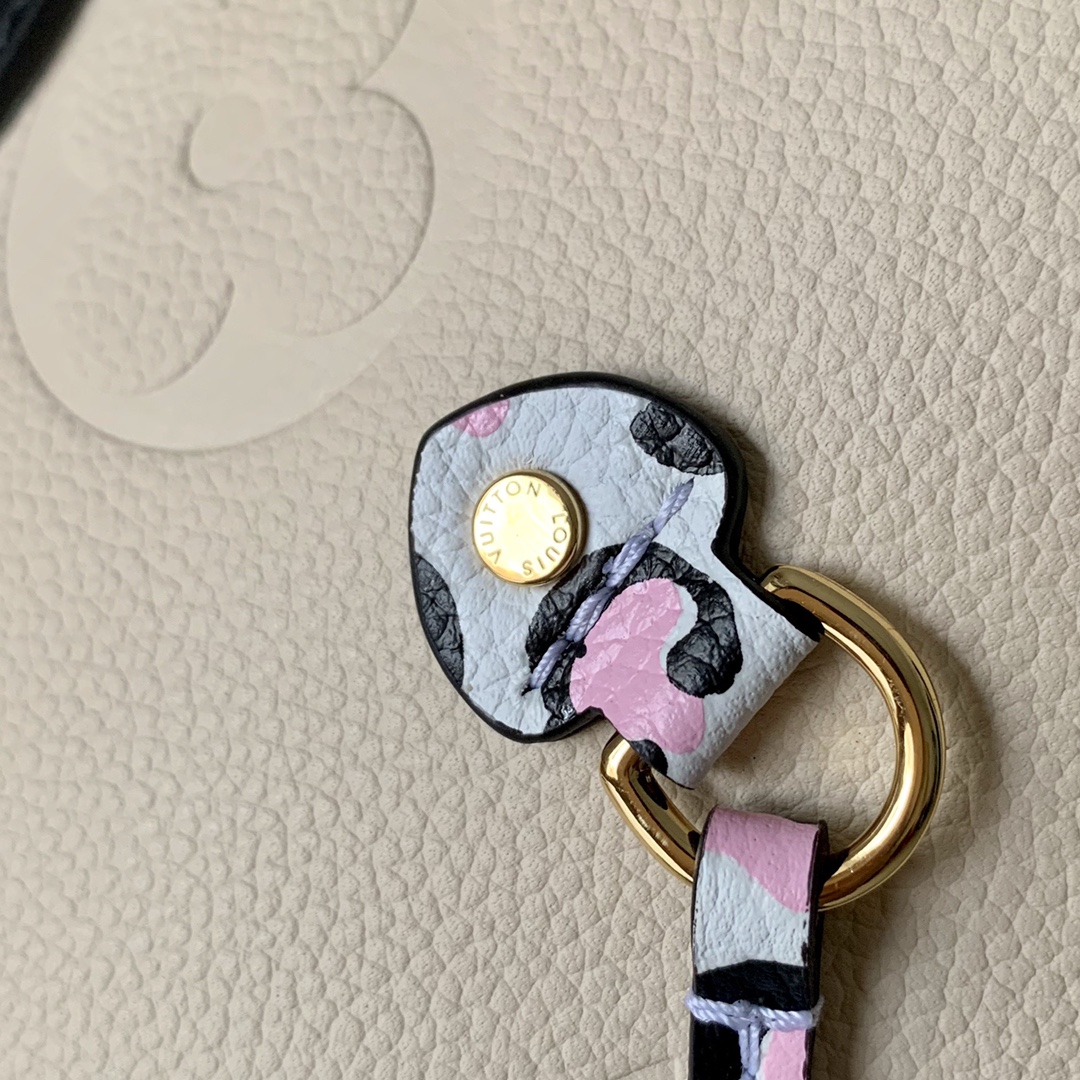 l0vis Vvtt0n neverfull mm monogram empreinte leather creme m58525 32 cm