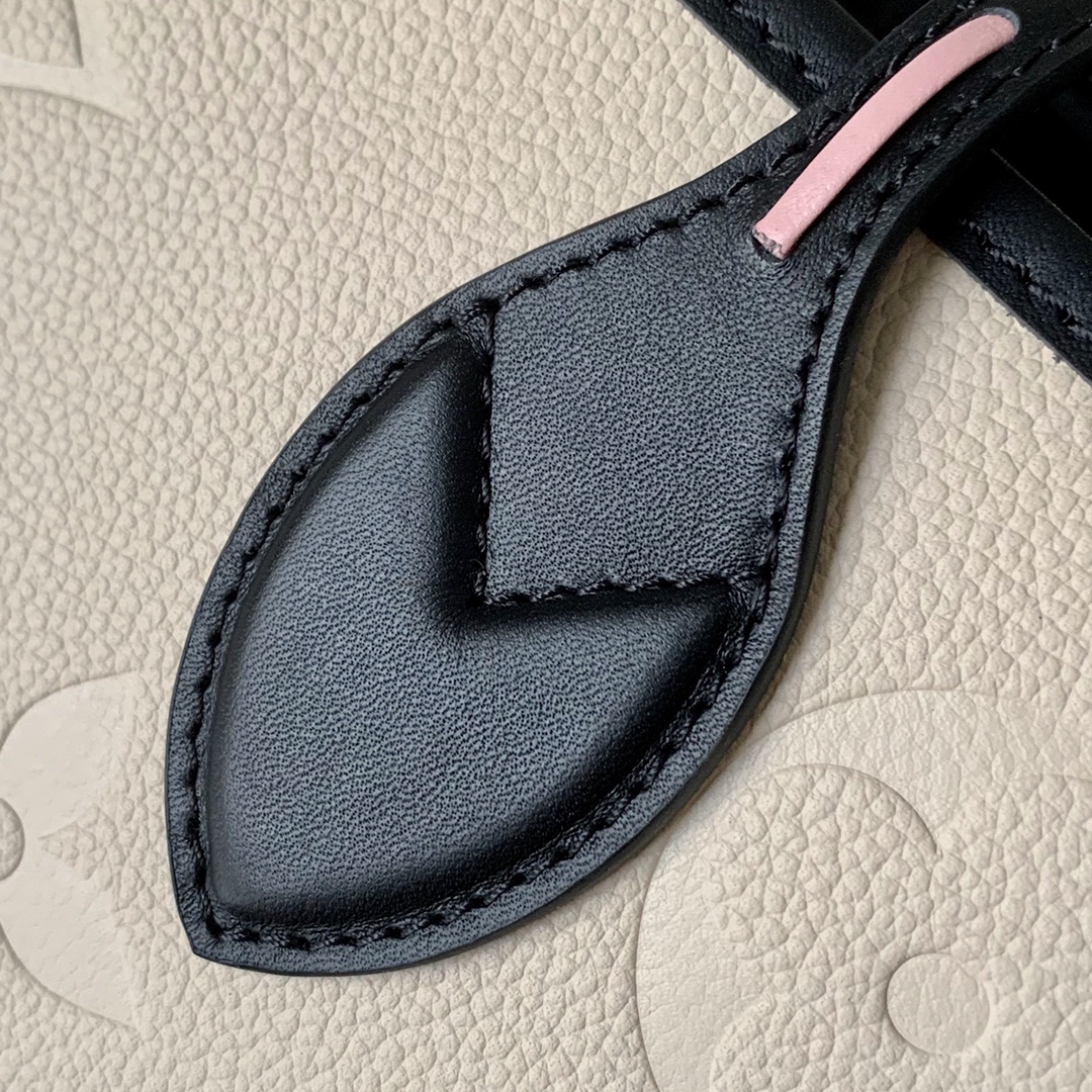 l0vis Vvtt0n neverfull mm monogram empreinte leather creme m58525 32 cm