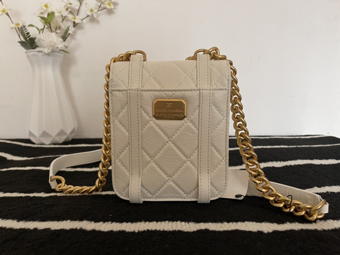 Ch**el mini aged calfskin and gold-tone metal messenger flap bag white as2695 17 x 14 x 7 cm