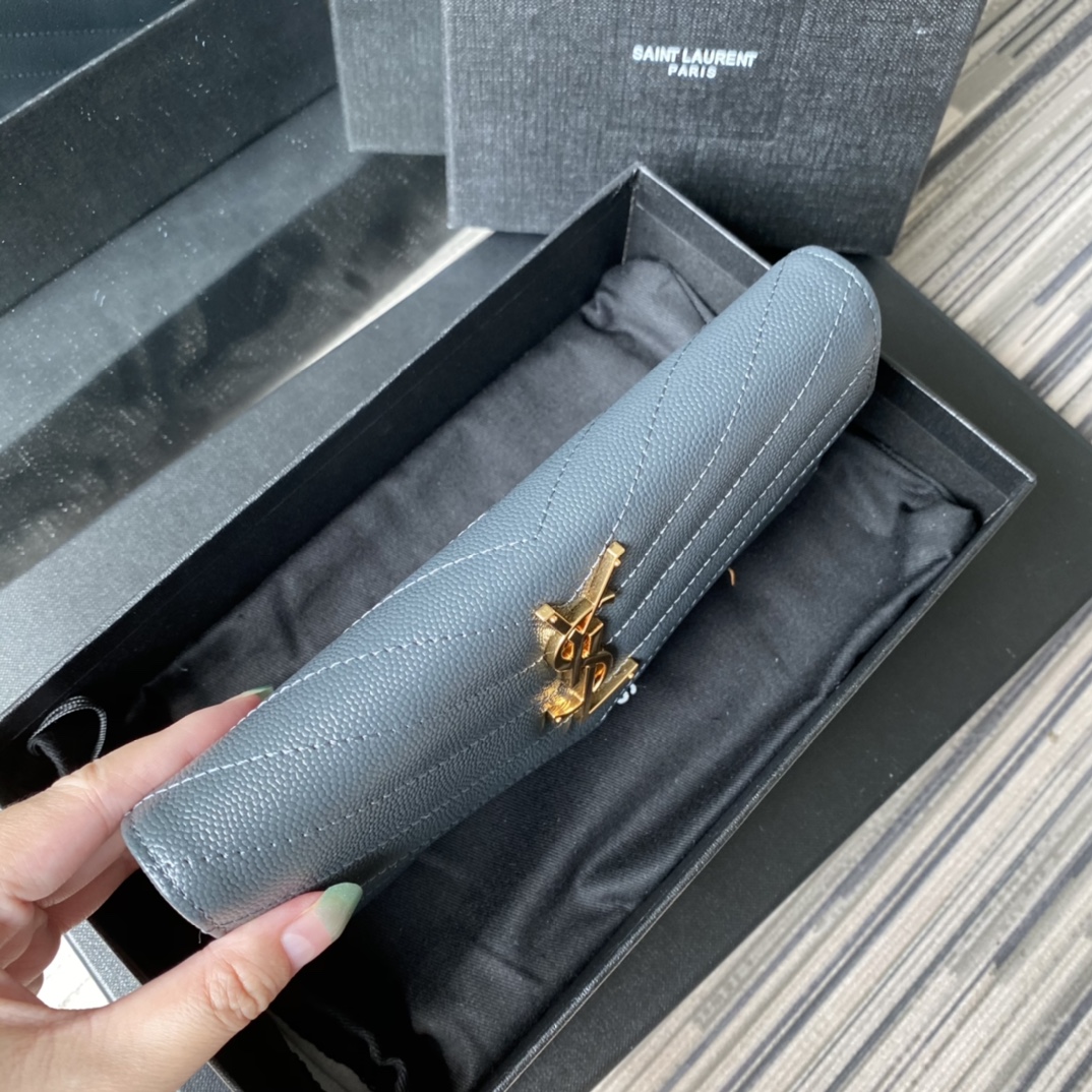 Y51 large monogram flap wallet in grain de poudre embossed leather blue 372264 19 x 11 cm