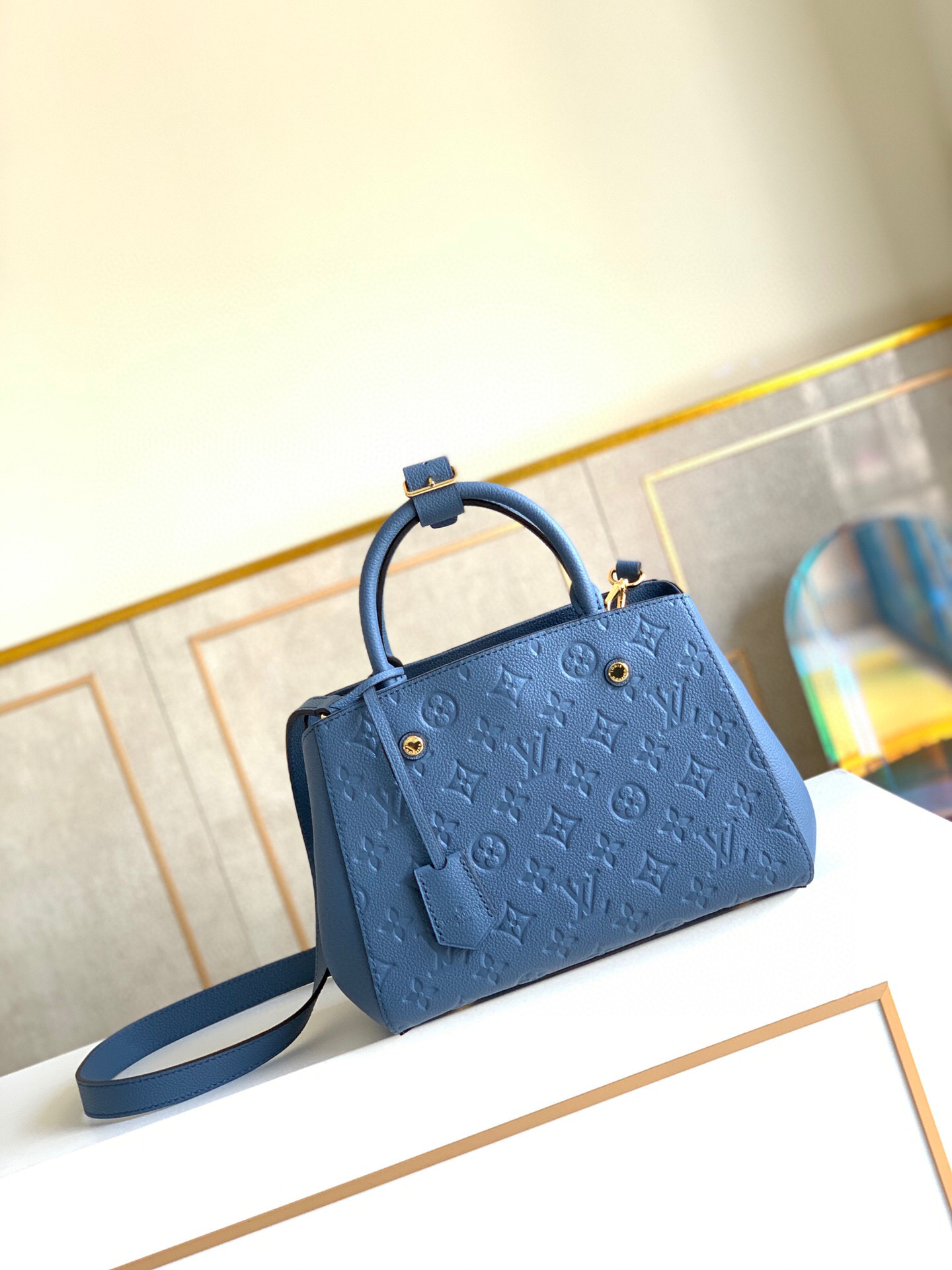 l0vis Vvtt0n montaigne bb monogram empreinte leather blue m42747 29 x 20 x 13 cm