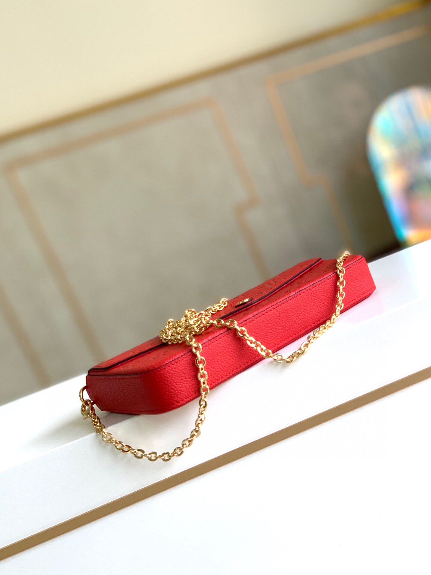 l0vis Vvtt0n fÉlicie pochette monogram empreinte leather red m63700 21 x 12 x 3 cm