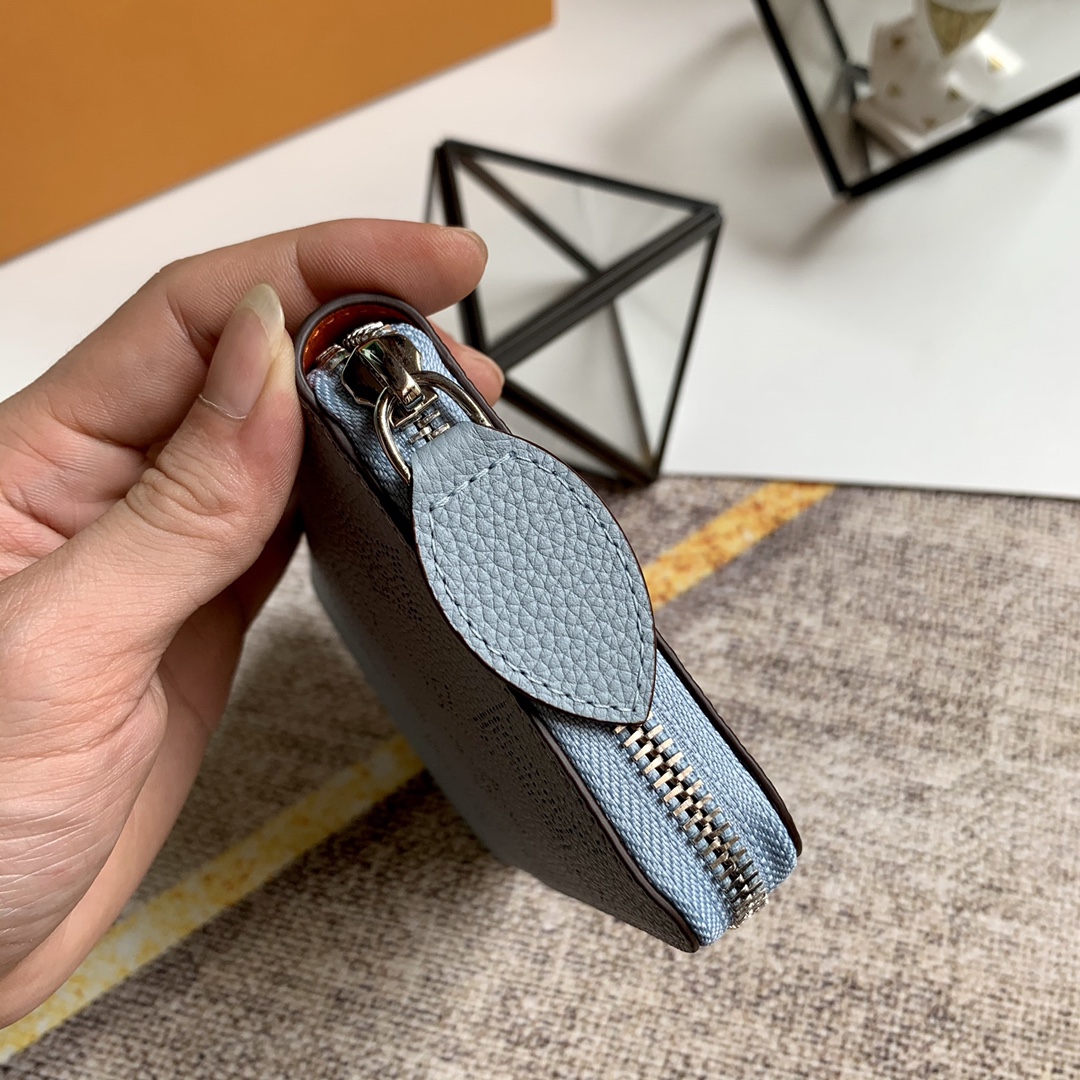 l0vis Vvtt0n zippy wallet monogram perforations mahina leather blue m61867 19 x 10 cm