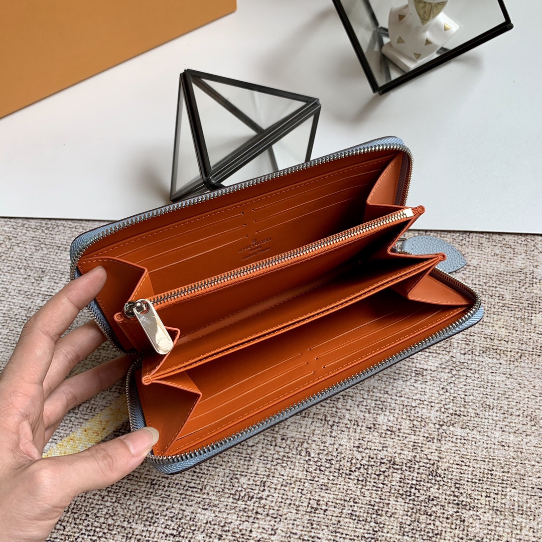 l0vis Vvtt0n zippy wallet monogram perforations mahina leather blue m61867 19 x 10 cm