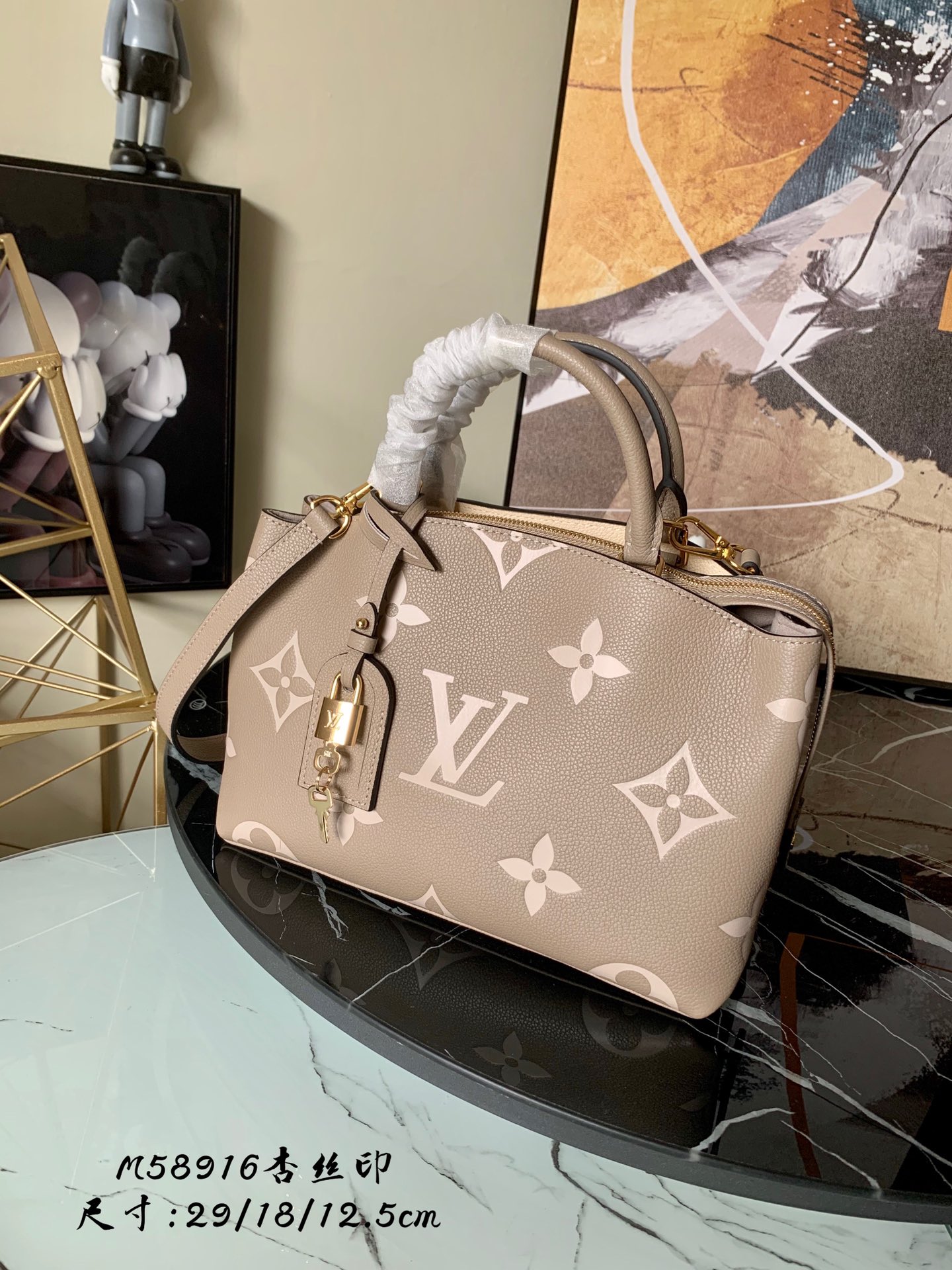 l0vis Vvtt0n petit palais bicolor monogram empreinte leather beige and creme m58914 29 x 18 x 12.5 cm