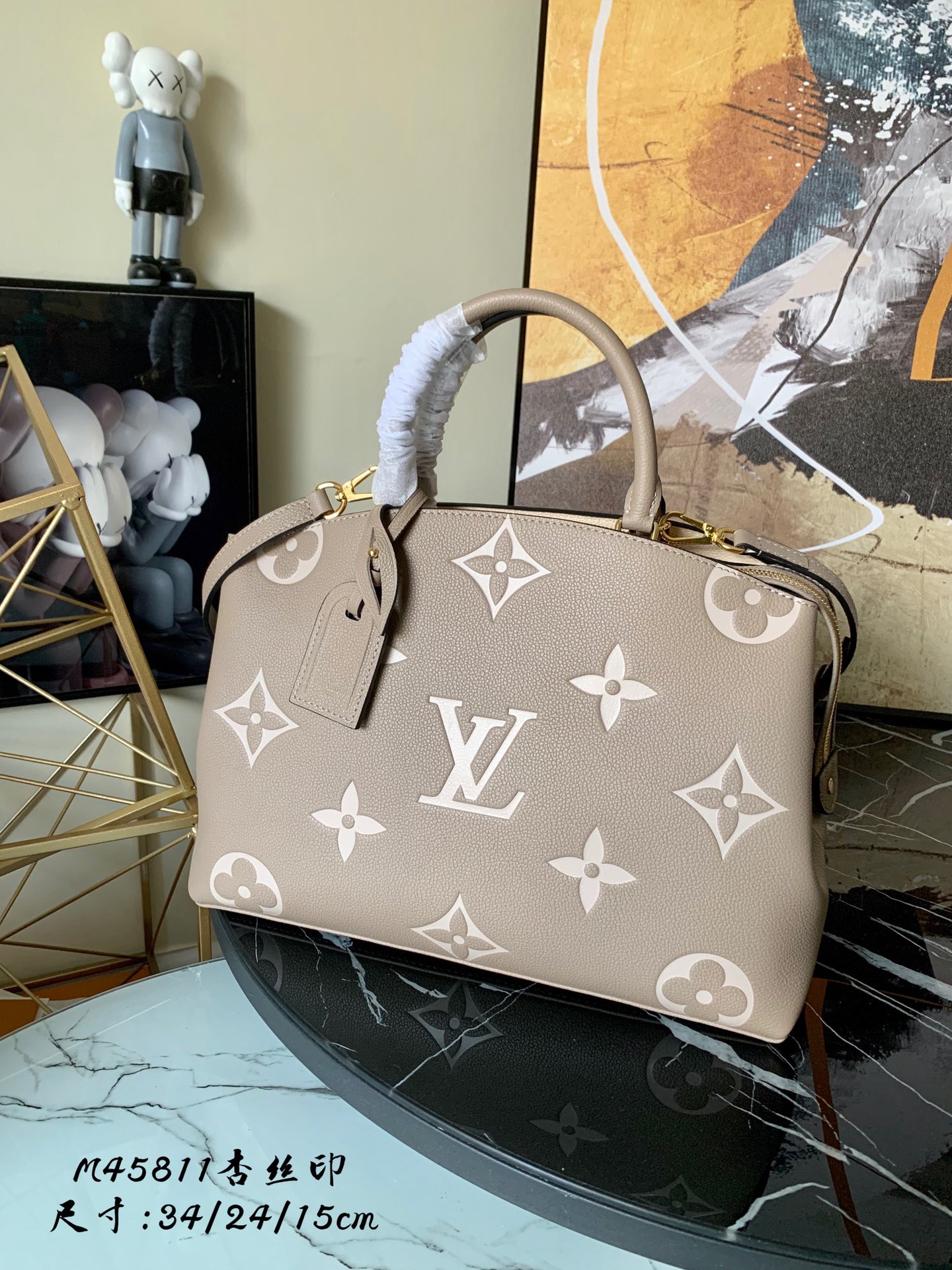 l0vis Vvtt0n grand palais biocolor monogram empreinte pattern beige and creme m45842 34 x 24 x 15 cm