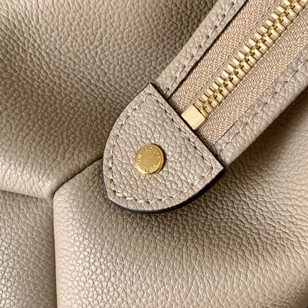 l0vis Vvtt0n grand palais biocolor monogram empreinte pattern beige and creme m45842 34 x 24 x 15 cm