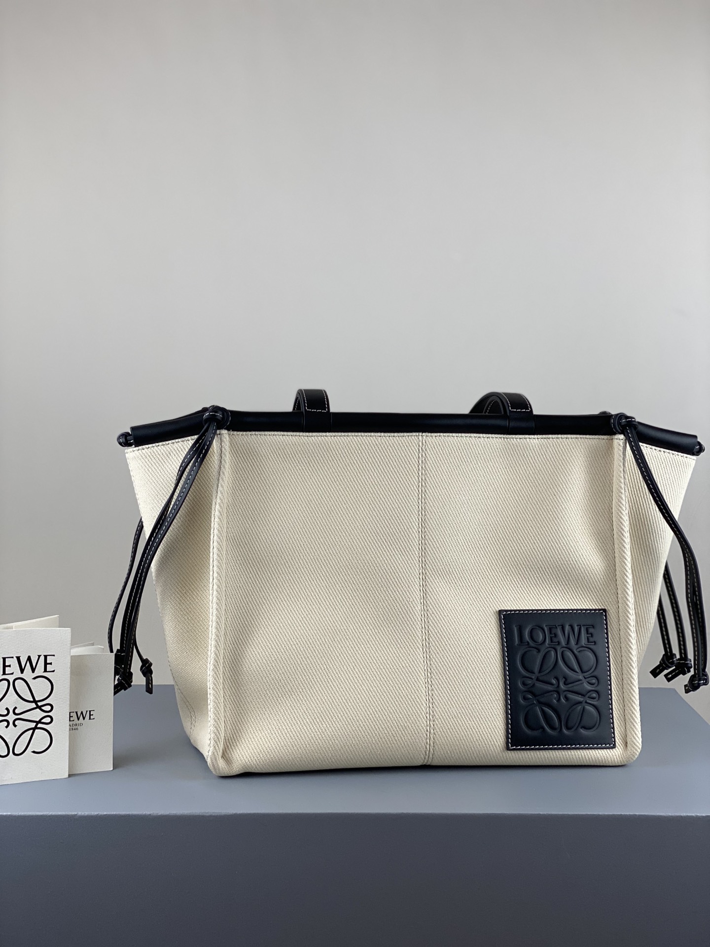 L0ew* small cushion tote bag canvas and calfskin light oat and black 330.02aa93 32 x 24 x 16cm