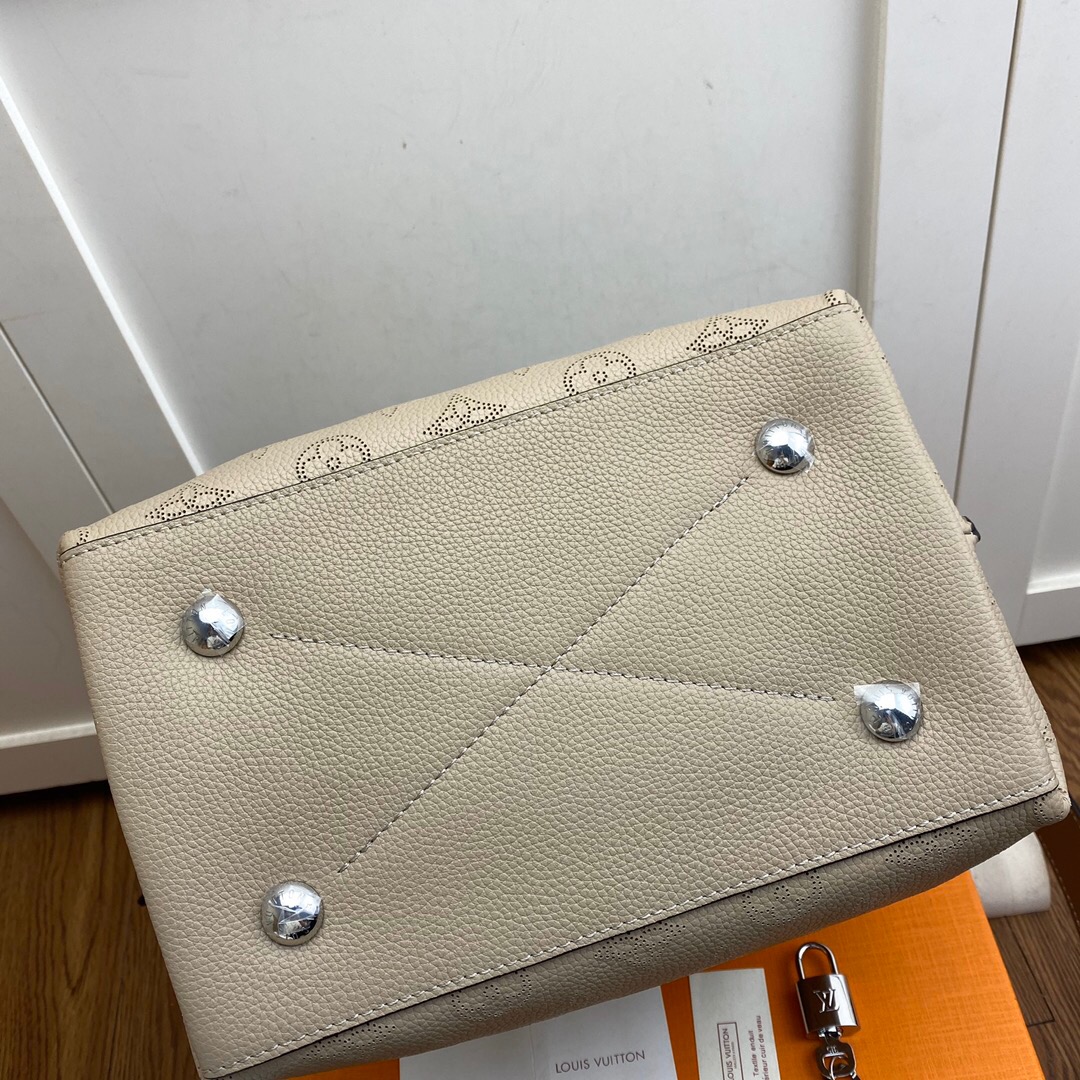 l0vis Vvtt0n muria mahina monogram motif galet m55799 25 x 25 x 20 cm