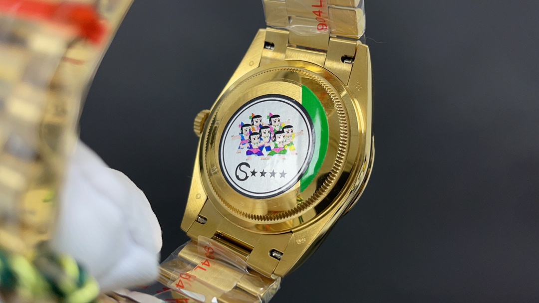 R01ex oyster perpetual day and  date  golden and blue 36 mm 2836